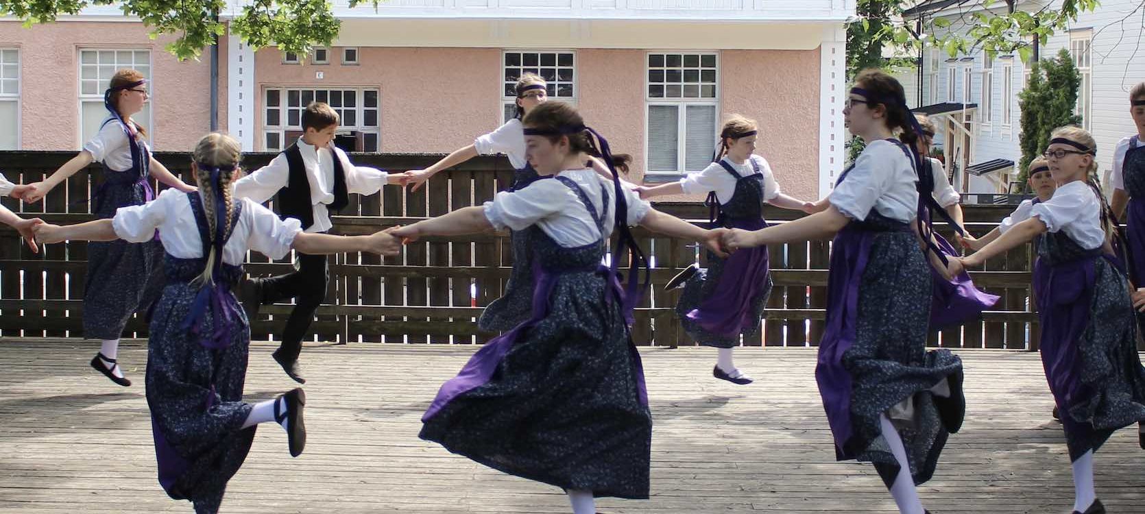 Finnish dancers performing traditional dance